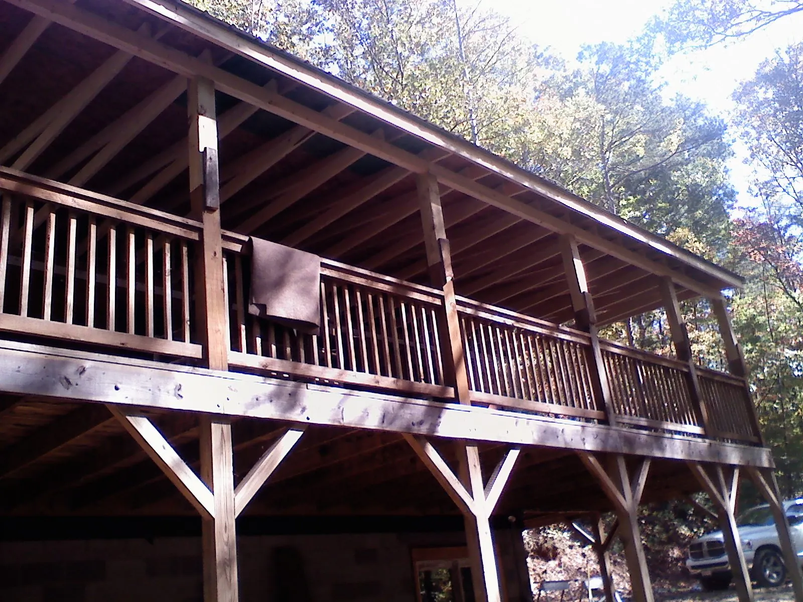 Timber framing under a new elevated porch and deck — Roof Leak Repair in Zion by Roofing Brothers